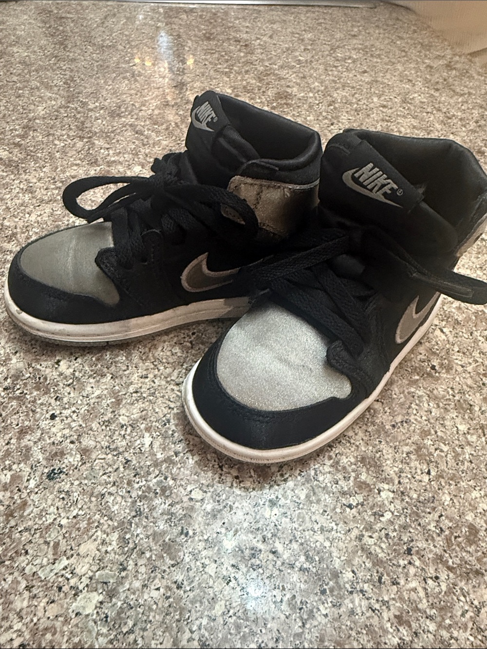 Nike Kids Black and Silver High-Top Sneakers with Metallic Accents